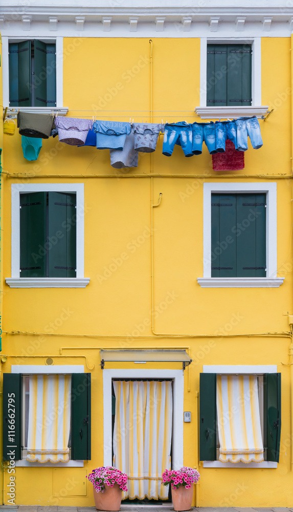 Bright Yellow Home in Burano, Italy