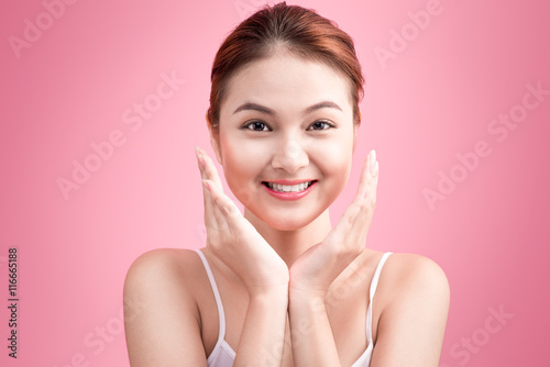 Portrait of Beautiful Skin care woman enjoy and relax touching h