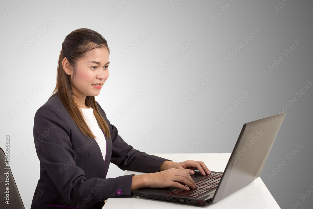 Asian businesswoman use of laptop computer. Asian businesswoman use of laptop computer.