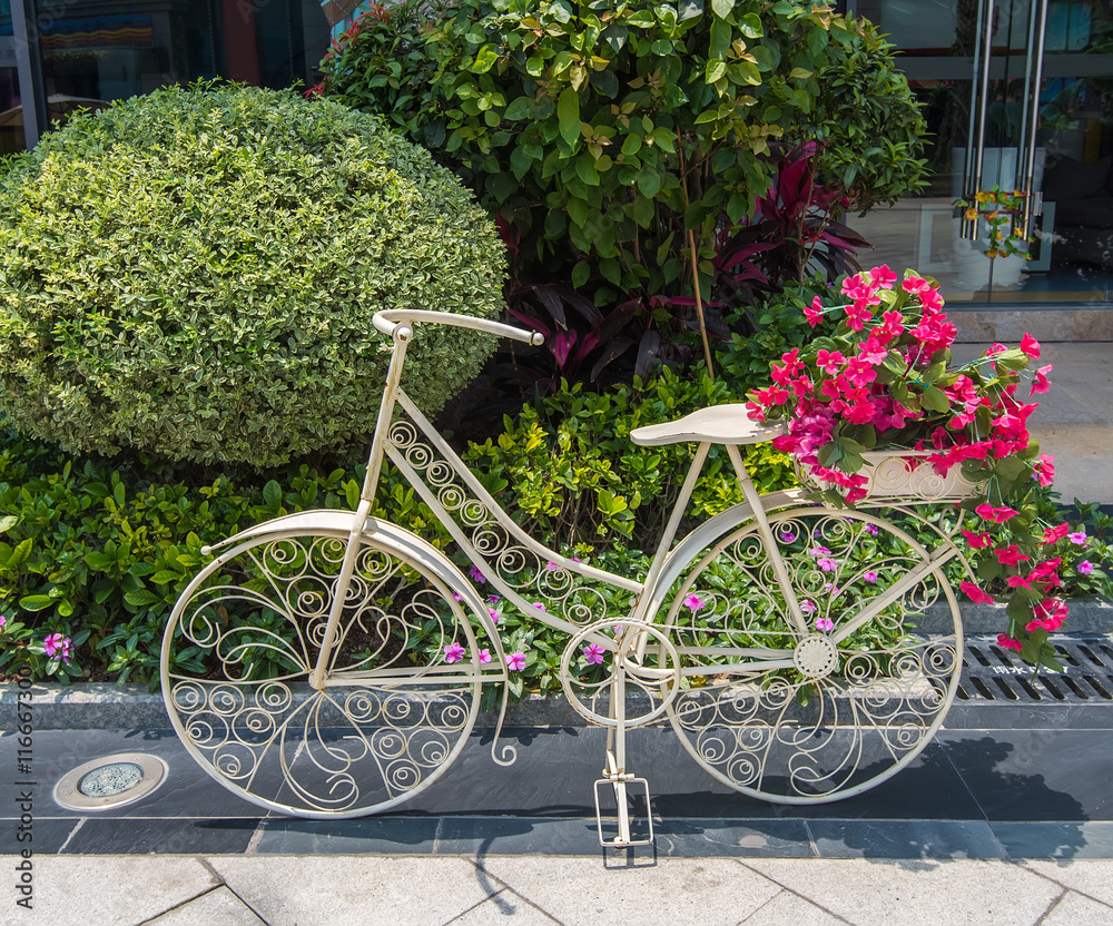 bicycle in flower garden