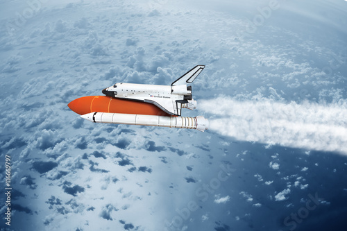 Space shuttle taking off to the sky ( NASA image not used )