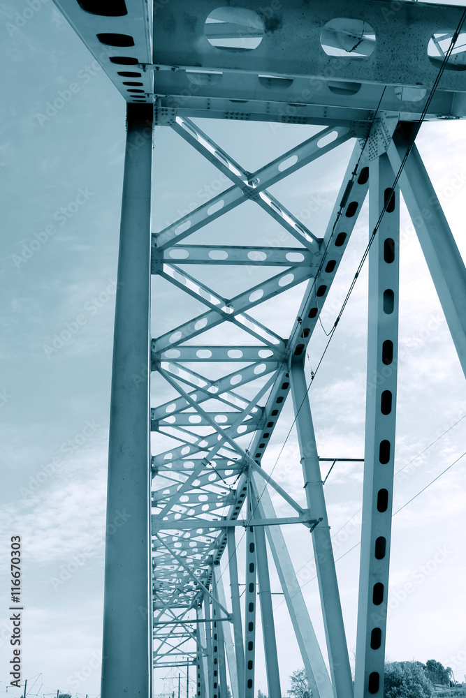 Railway metal bridge perspective view. Monochrome image Railway metal bridge perspective view. Monochrome image