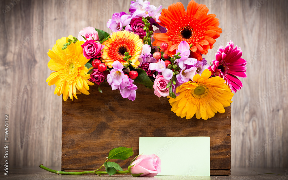 Various flowers on wooden background Various flowers on wooden background