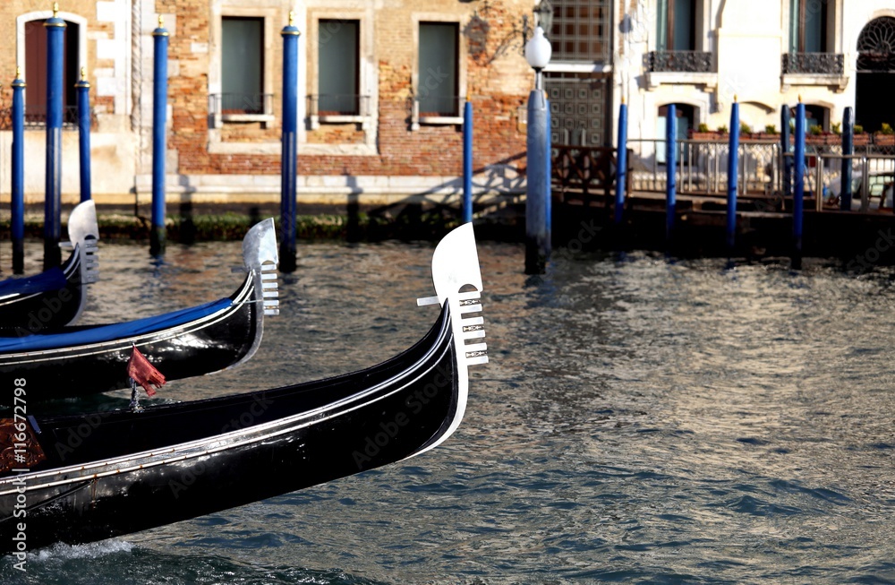 Venetian gondolas sailing the waters of the Grand Canal