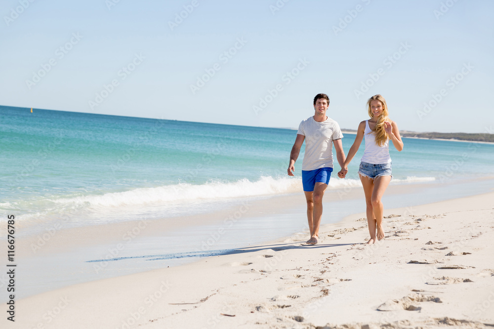 Romantic young couple on the beach