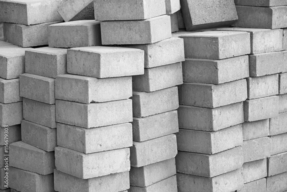 Silicate grey paving bricks in stacks Silicate grey paving bricks in stacks
