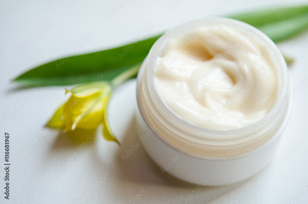 Jar of beauty cream with tulip Jar of beauty cream with tulip