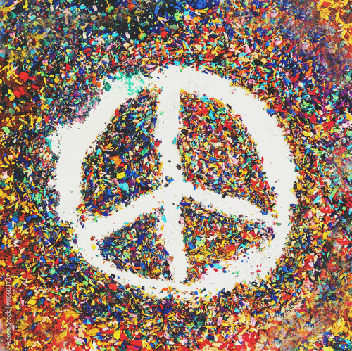 Obraz na plátně Peace symbol on scraps of colorful pastel oil colors