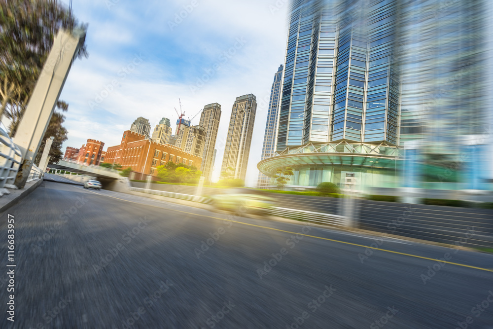 Fototapeta premium City road with moving traffic,tianjin china.