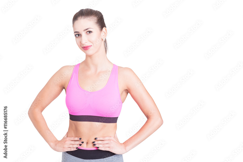 Beautiful fit trainer posing in sporty wear Beautiful fit trainer posing in sporty wear
