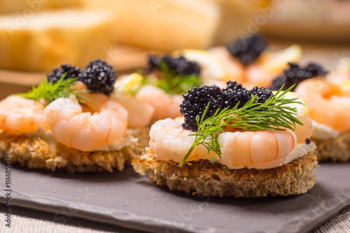 Shrimp Appetizer served on toasted bread