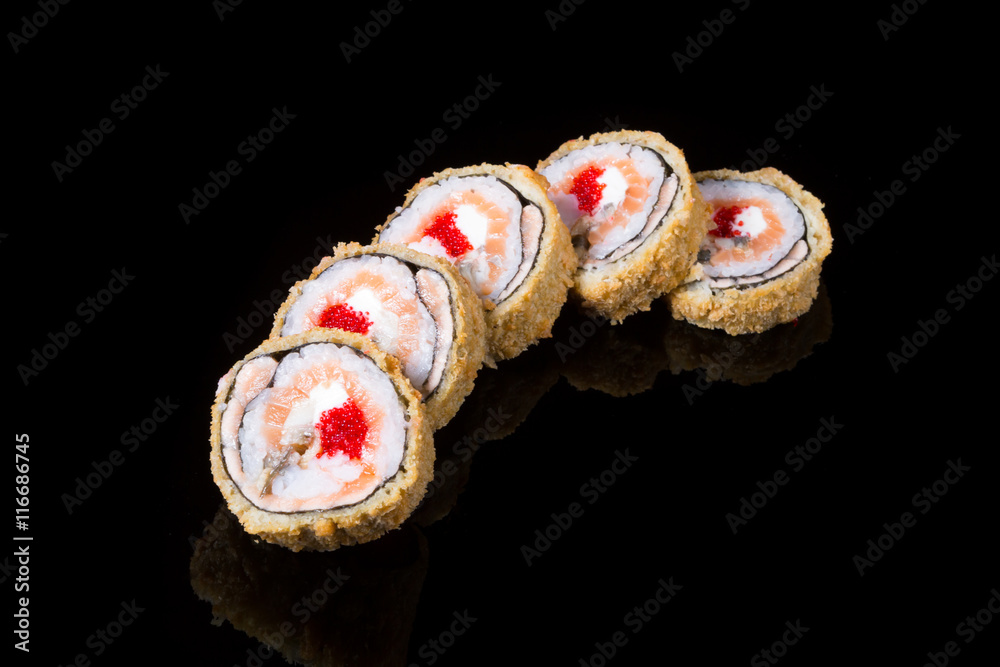 Japanese rolls on black background Japanese rolls on black background