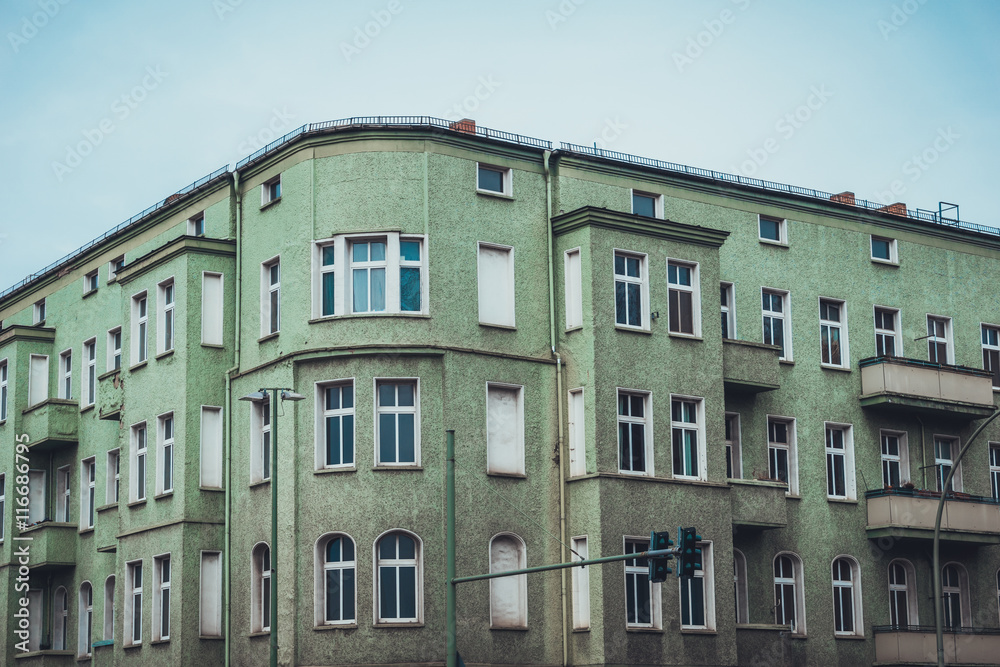 Apartments with curved corner and green exterior