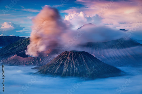 Bromo, Batok and Semeru volcanoes at sunrise, Java island, Indon
