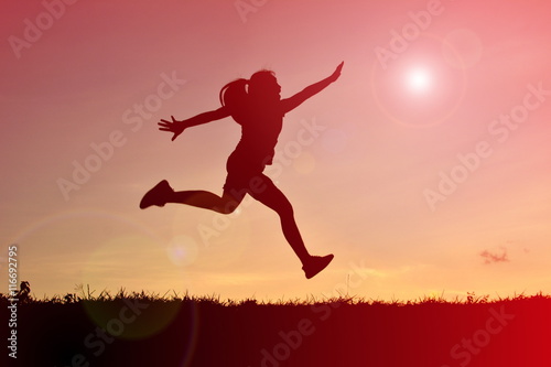 Silhouette women jumping