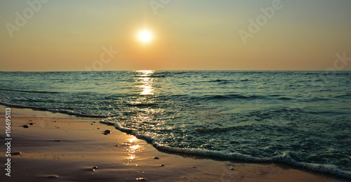 Sunrise on the  beach photo