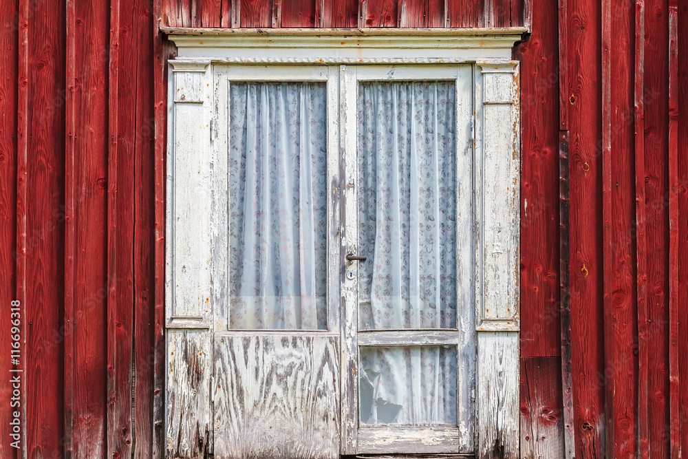 Weathered door of an old Swedish farmhouse