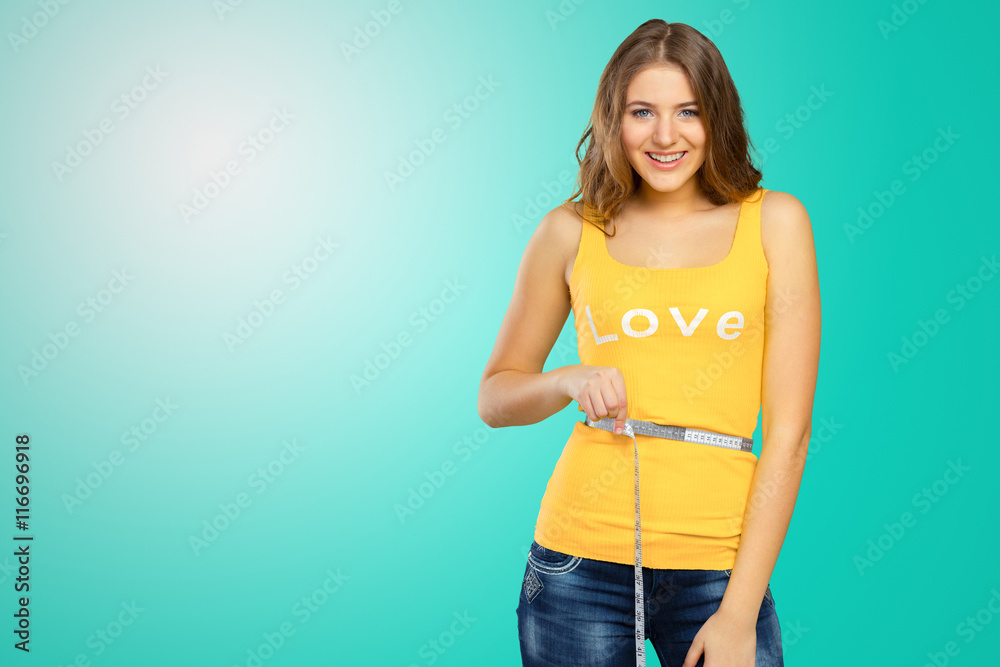 Ταπετσαρία Beautiful woman measuring her waist with a measuring tape