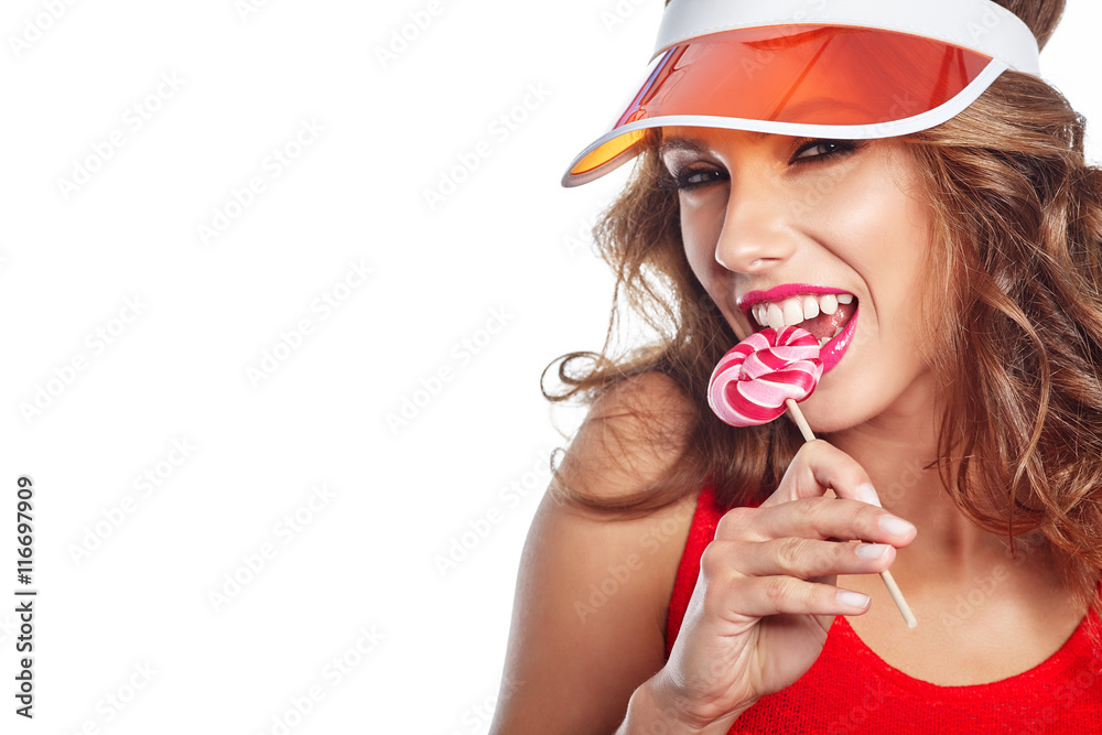 Fototapeta premium Beauty fashion model girl Eating colourful lollipop. Lollypop. S