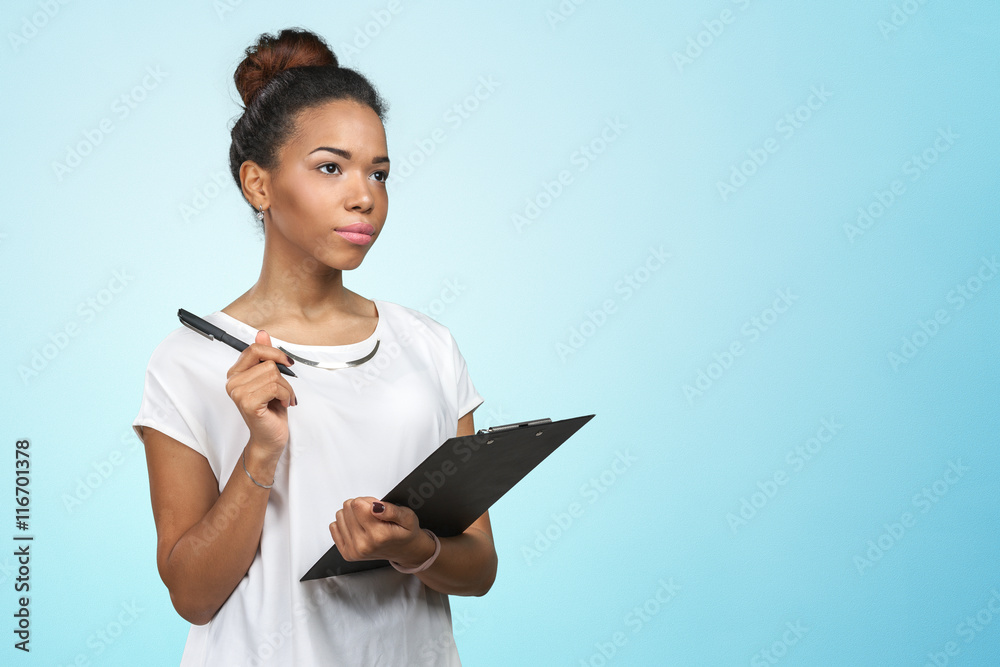 young beautiful african american woman with clipboard young beautiful african american woman with clipboard
