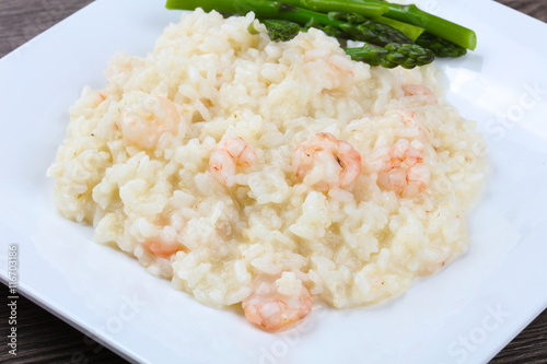 Risotto with shrimps and astaragus photo