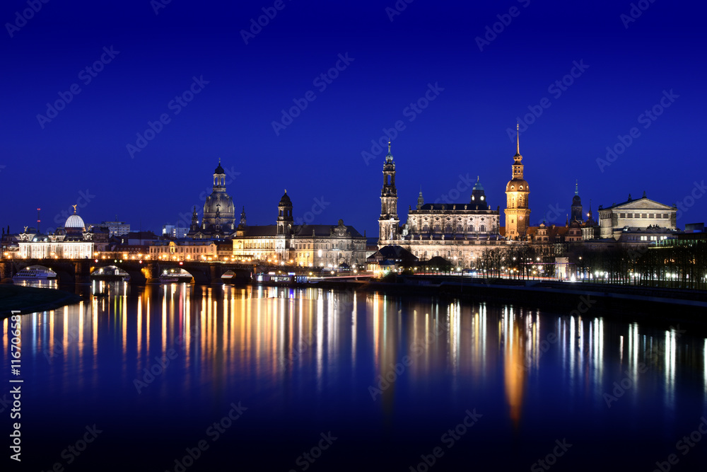 Dresden, Germany - Dresden Cathedral of the Holy Trinity and the Royal Palace seen from the Elbe river at sunset