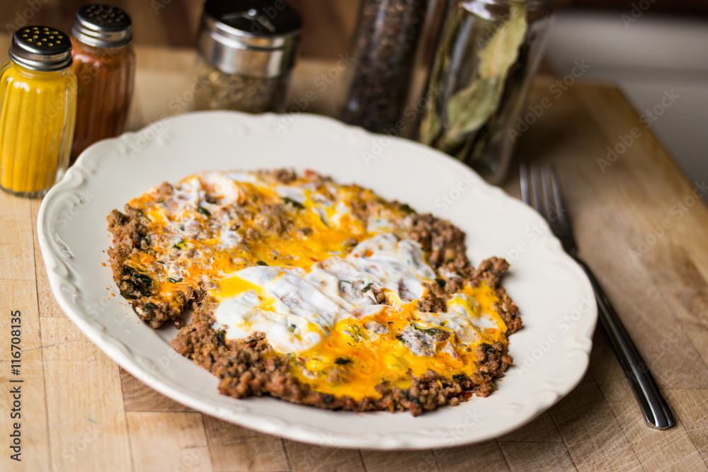 Fried egg with minced meat. Fried egg with minced meat.