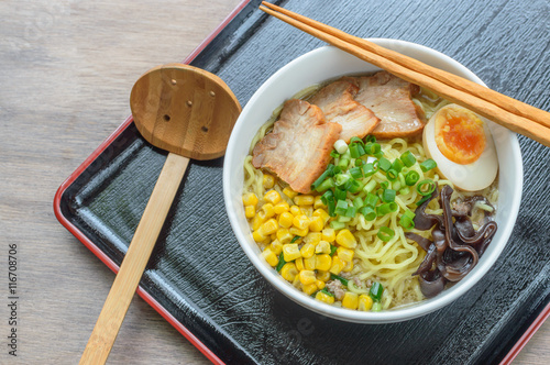 Miso ramen is a Japanese dish consisting of ramen noodles in a miso flavored broth with various toppings. photo