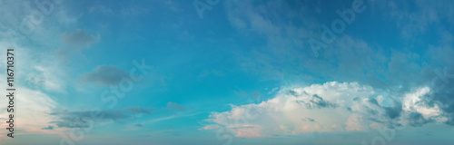 Panorama of the daytime sky with clouds