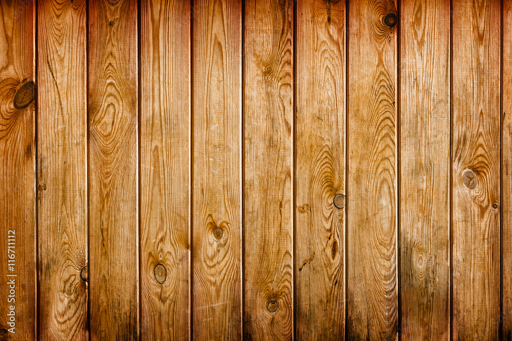 Fototapeta premium Wall covered with brown grunge wooden boards - natural backgroun