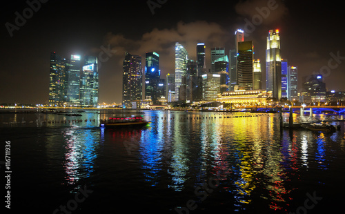 Brilliantly Lit Singapore Skyline from the Harbor at Night