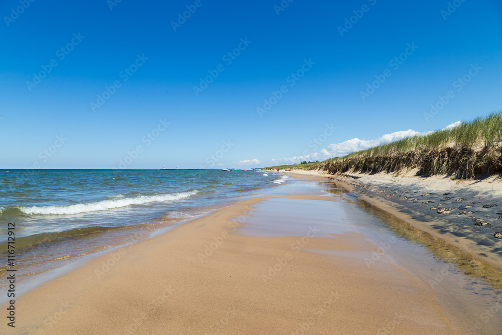 Oval beach/ Long sandy beach and dunes state park at Saugatuck, Michigan