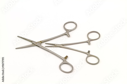 Surgical instrument (hemostat or artery clamp ) on white background