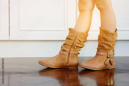boot brown shoes of little girl