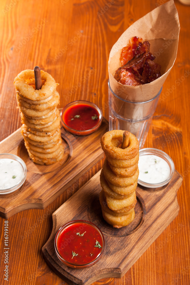 snacks to beer on a wooden table
