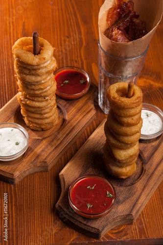 snacks to beer on a wooden table