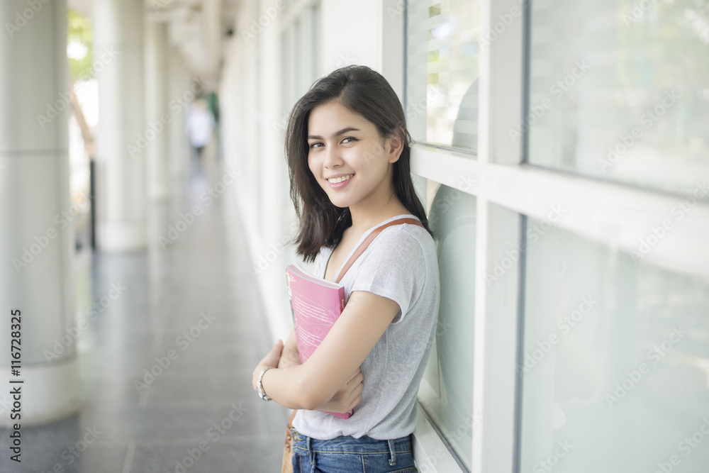 A portrait of an Asian university student on campus A portrait of an Asian university student on campus