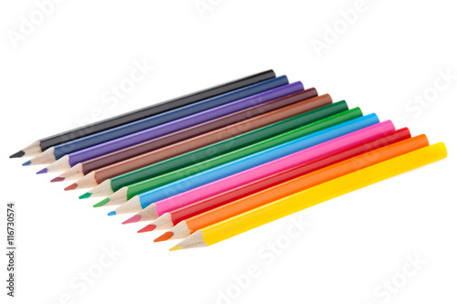 Many colorful pencil like a rainbow on diagonal line, isolated white.