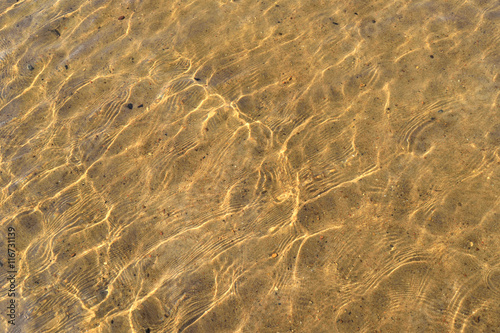 bottom of the river with fine sand background