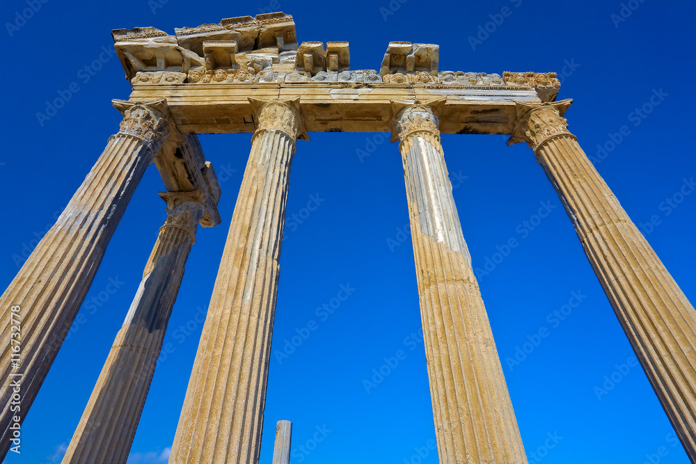 Turkey. Side. The temple of Apollo - five marble columns in Corinthian order and the architrave decorated with Medusa heads