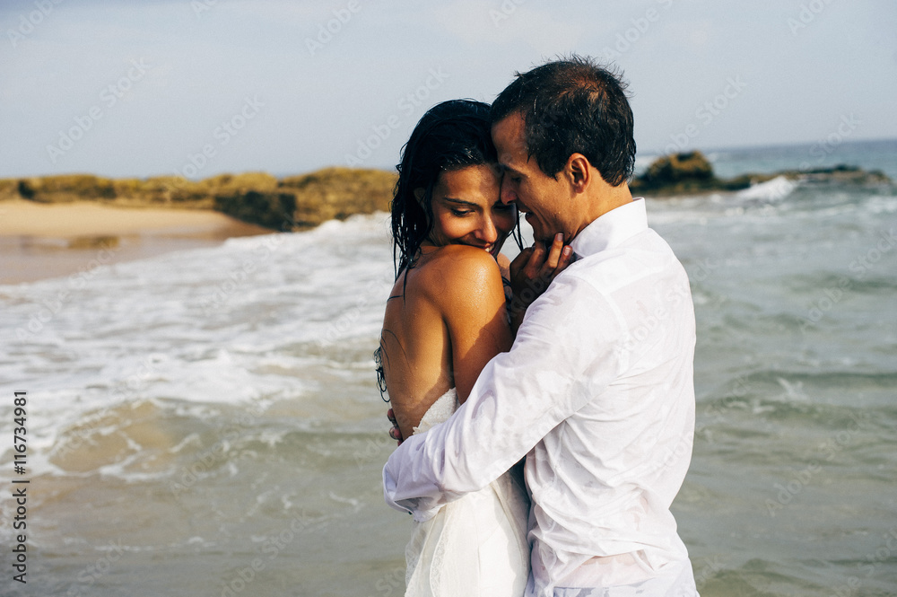 Wedding Romance - bride and groom on the beach
