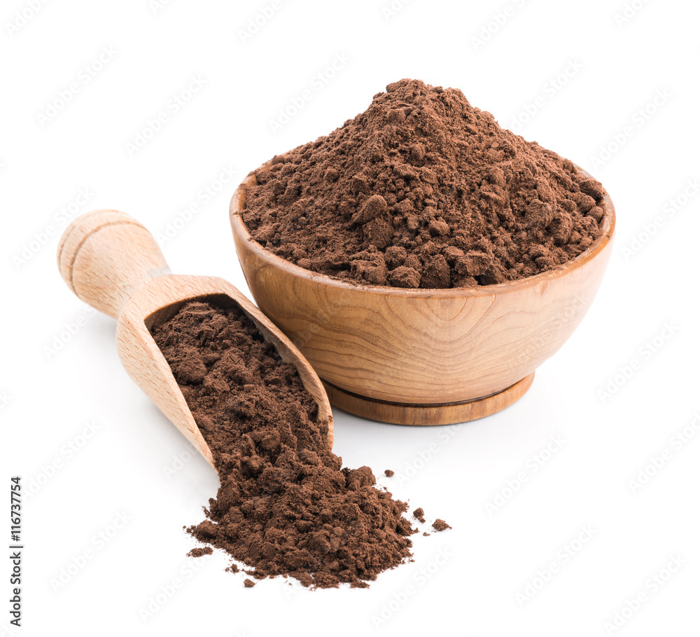 Cocoa powder in a wooden bowl isolated on white Cocoa powder in a wooden bowl isolated on white