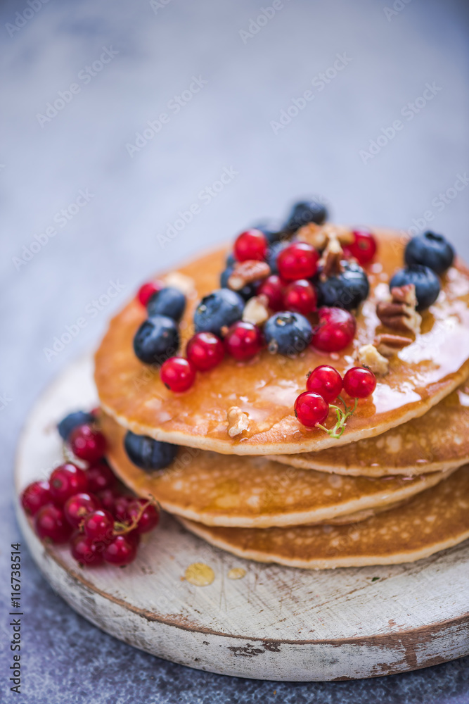 pancakes with redcurrant and berries