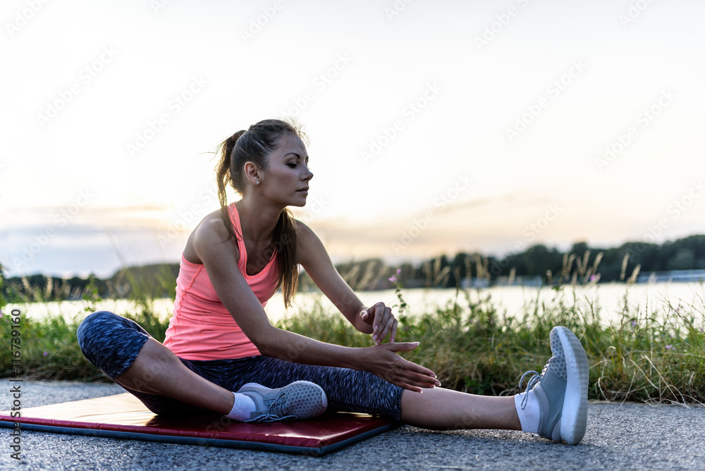 Fitness Girl Working Out By he River