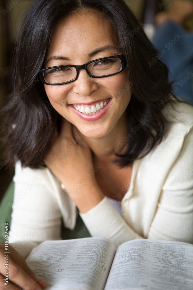 Asian woman reading. Asian woman reading.