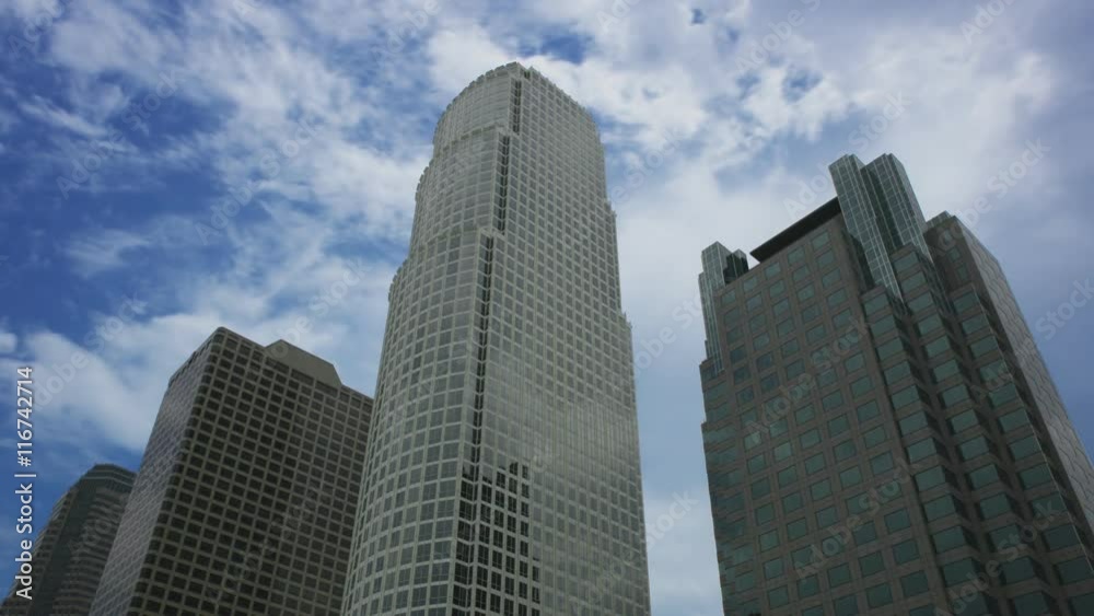 Time lapse of clouds behind skyscrapers in downtown Los Angeles. Time lapse of clouds behind skyscrapers in downtown Los Angeles.