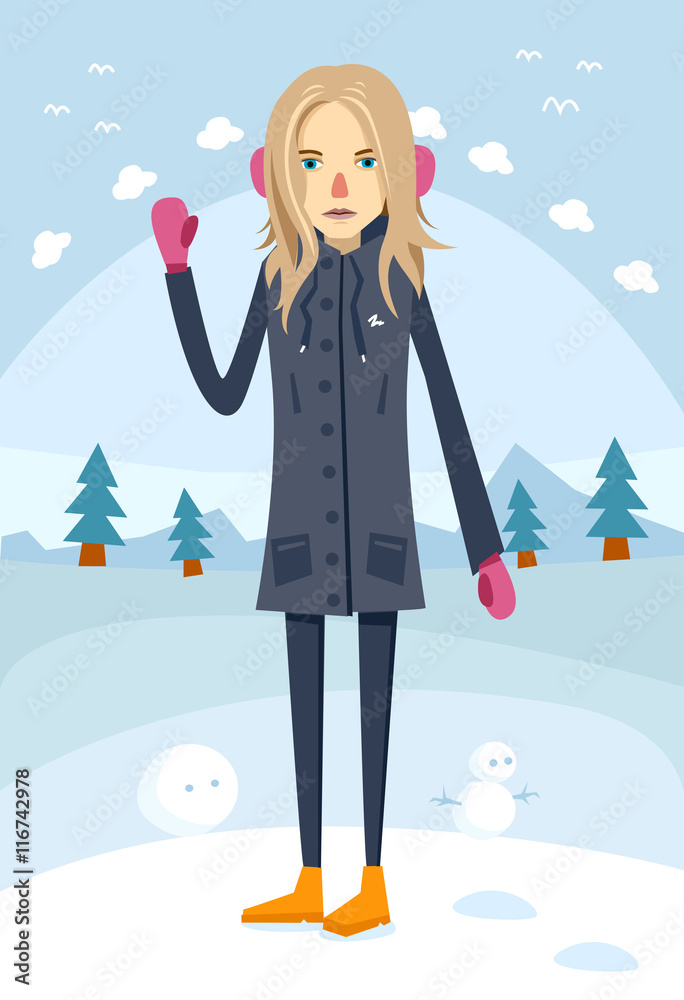 Beautiful girl standing in warm clothes