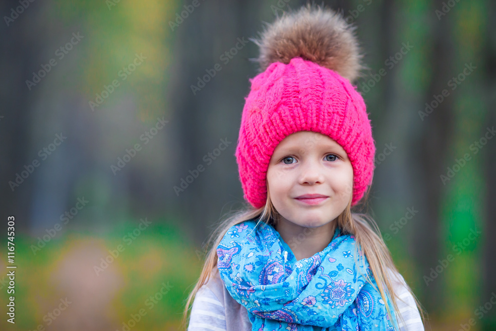 Portrait of adorable little girl outdoors at beautiful autumn day Portrait of adorable little girl outdoors at beautiful autumn day