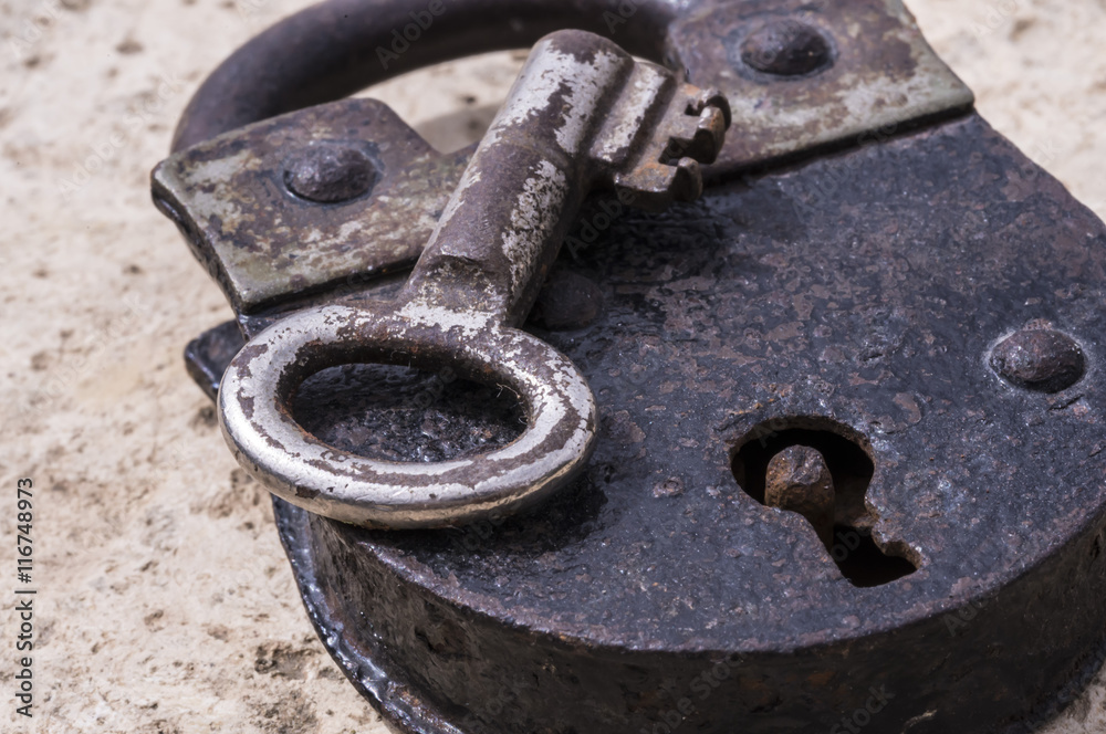Old rusty metal padlock and key Old rusty metal padlock and key
