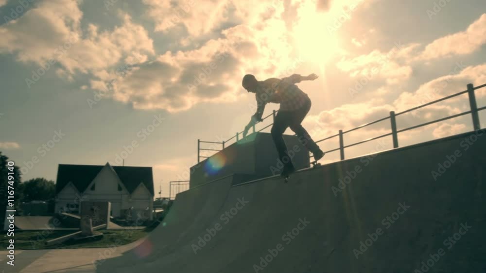 Jump skateboarder trick in the park. Healthy lifstyle and sport concept